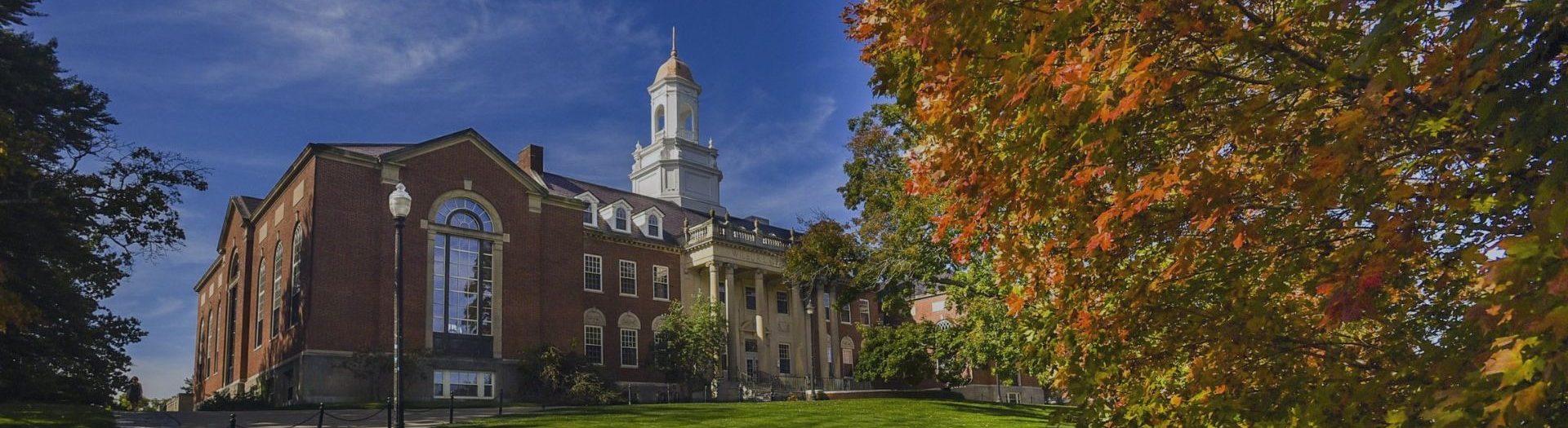 Image shows the Wilbur Cross Building on the grounds of the University of Connecticut Arboretum